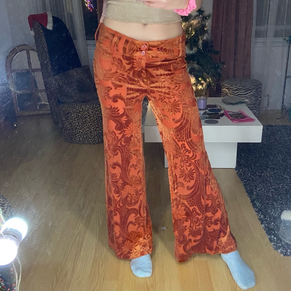 UO rust velvet pants with flower pattern